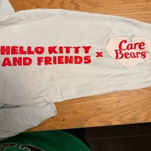 Bioworld Light Blue Hoodie with Rainbow Graphic